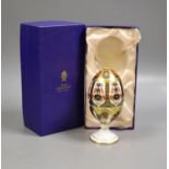 A Royal Crown Derby 'Old Imari' pattern 'egg and eggcup' set, boxed