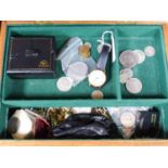 A quantity of assorted costume jewellery and coins etc. in a walnut box.