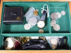 A quantity of assorted costume jewellery and coins etc. in a walnut box.