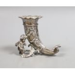 A late Victorian small silver cornucopia vase, with putto surmount, import marks for Thomas Glaser,