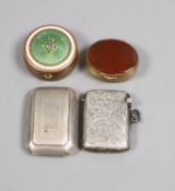 A George III silver curved snuff box, Birmingham, 1813, 52mm, a silver vesta case and two metal
