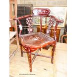 A 20th century Chinese mother of pearl inlaid hardwood corner elbow chair