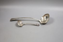 A George III silver Old English pattern soup ladle, London, 1804, 31.1cm and a similar George IV