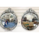 A pair of circular Venetian etched glass mirrors, diameter 58cm