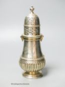 A George V silver baluster sugar caster, Thomas Bradbury & Sons, Sheffield, 1919, 21.3cm, 10oz.