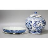 A 19th century Chinese blue and white jar and cover, four character Kangxi mark, 22cm high and a