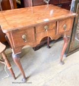 An early 18th century feather banded walnut three drawer lowboy, width 70cm, depth 48cm, height