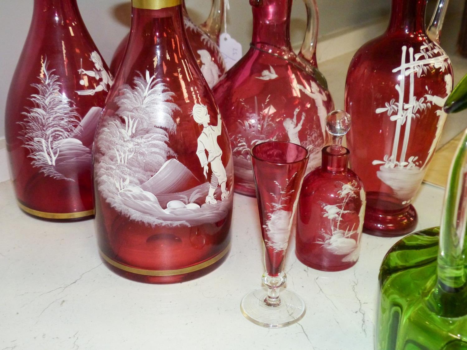 A collection of Mary Gregory cranberry and green glass decanters, jug etc (9), tallest 28.5 cm - Image 6 of 6