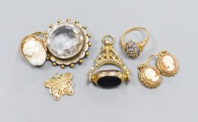 A 9ct gold cameo ring, a pair of similar earrings, yellow metal settings, a 9ct gold gem-set ring,