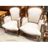 A pair of Louis XV style mahogany fauteuils, width 66cm, depth 55cm, height 94cm