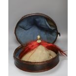 A Chinese late Qing mandarin hat, with gilt finial and original hide case