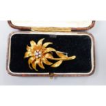 An early 1970's 18ct gold and seven stone diamond set flower brooch, by Cropp & Farr, London, 1972,