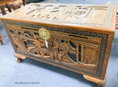 A Chinese carved camphorwood chest, width 102cm, depth 52cm, height 62cm