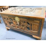 A Chinese carved camphorwood chest, width 102cm, depth 52cm, height 62cm