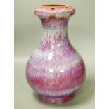 A Chinese crimson flambé glazed vase, 32cm