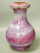 A Chinese crimson flambé glazed vase, 32cm