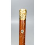 A long George III gold mounted malacca cane, 110.5 cm