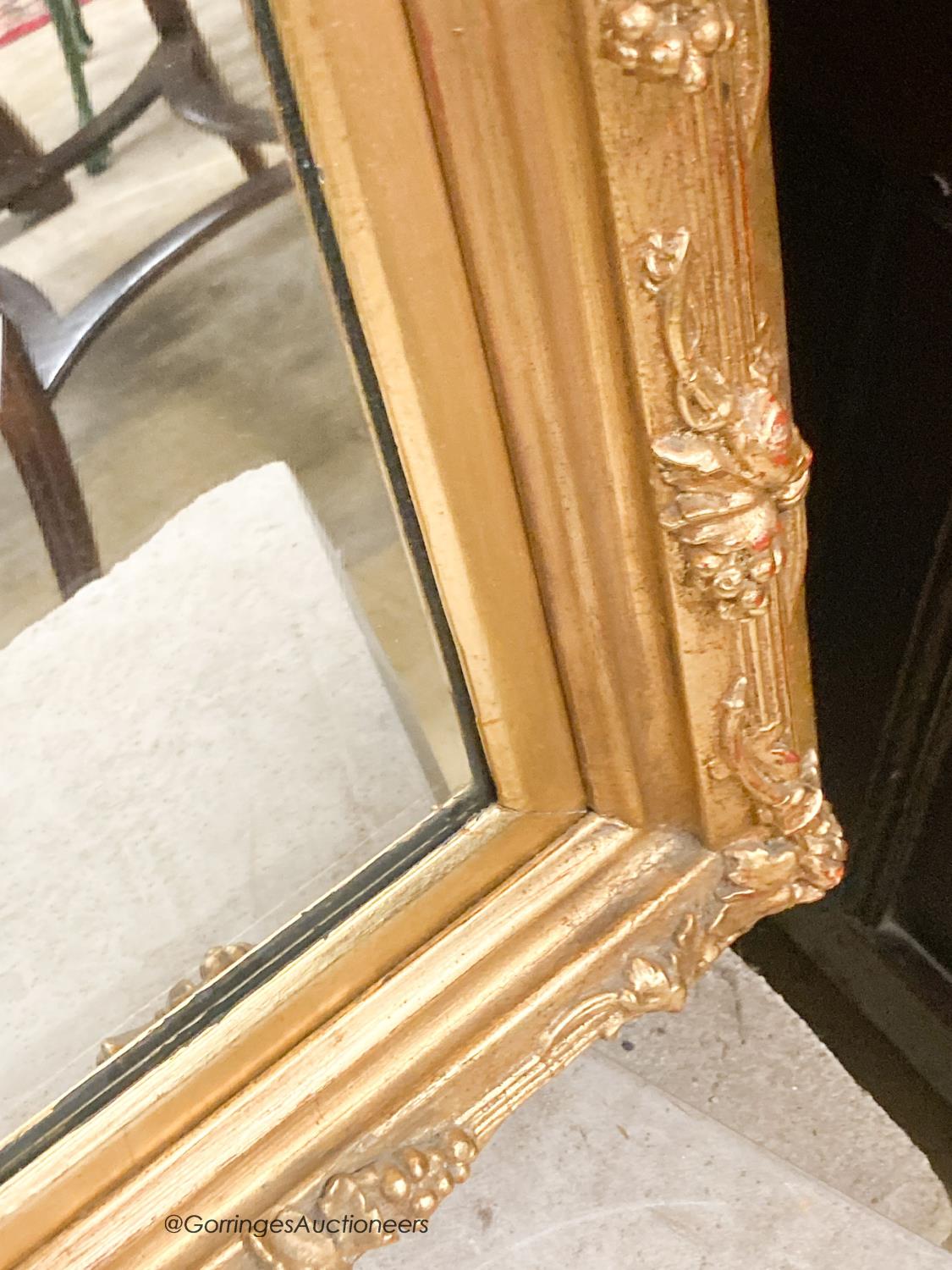 A rectangular carved giltwood framed wall mirror, width 67cm, height 132cm - Image 5 of 5