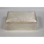 An Edwardian silver mounted rectangular cigar box, Stokes & Ireland Ltd, Chester, 1907, with later