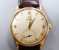 A gentleman's 1950's 9ct gold Omega manual wind wrist watch, movement c.266, on associated strap,