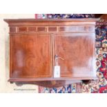 An Edwardian mahogany hanging two door wall cabinet, width 55cm, depth 24cm, height 54cm
