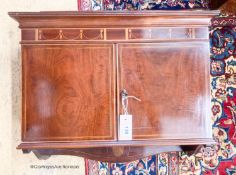 An Edwardian mahogany hanging two door wall cabinet, width 55cm, depth 24cm, height 54cm