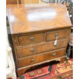 An early 20th century walnut bureau, width 66cm, depth 45cm, height 93cm