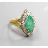 A modern Victorian style 18ct gold, emerald and diamond marquise set dress ring, size L, gross 5.9