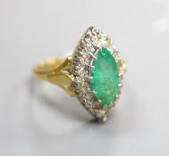 A modern Victorian style 18ct gold, emerald and diamond marquise set dress ring, size L, gross 5.9