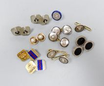 A pair of yellow and white metal, diamond and black enamel cufflinks and three similar dress studs,