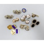 A pair of yellow and white metal, diamond and black enamel cufflinks and three similar dress studs,