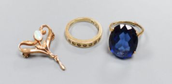 A modern 9ct gold Art Nouveau style gem set pendant and two 9ct and gem set rings, gross 14.2