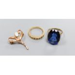 A modern 9ct gold Art Nouveau style gem set pendant and two 9ct and gem set rings, gross 14.2