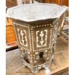 A Middle Eastern mother of pearl and bone inlaid octagonal topped coffee table, width 45cm, height