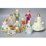 Three Worcester F.G. Doughty figures of children, 4 others and 2 figurines (9)including a woodland