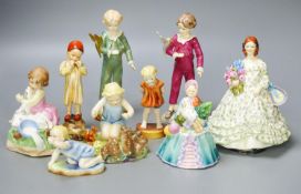 Three Worcester F.G. Doughty figures of children, 4 others and 2 figurines (9)including a woodland