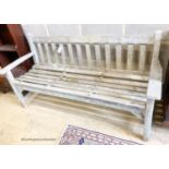 A weathered teak garden bench, length 159cm, depth 56cm, height 81cm