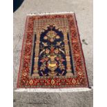 A Qom rug, 150 x 103cm