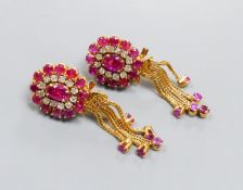A pair of Indian yellow metal, ruby and diamond cluster earrings with detachable tassel drops,