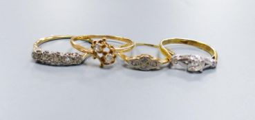 Three assorted 18ct and diamond set rings, including two stone crossover, gross 6.5 grams and a