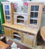 A stripped pine dresser, W.185cm D.66cm H.202cm