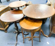Three George III and later circular mahogany tripod tables, largest diameter 60cm together with a