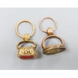 Two 19th century yellow metal overlaid fob seals, one with citrine and one with carnelian, both