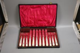 A cased set of six pairs of mother of pearl handled dessert eaters, Mappin & Webb, Sheffield, 1880,