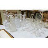 A Victorian diamond cut claret jug and decanter, assorted other decanters and champagne flutes