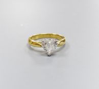 A modern 18ct gold and solitaire heart shaped diamond ring, size K, gross weight 3.6 grams,the