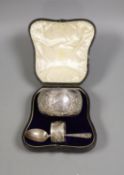 A Victorian cased matched embossed silver christening trio, comprising , bowl, napkin ring and