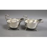 A pair of Edwardian silver sauceboats, with flying scroll handles, Henry Stratford Ltd, Sheffield,