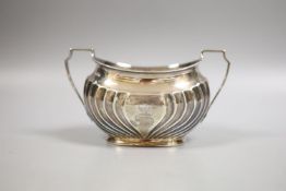 A late Victorian silver two handled sugar bowl, Atkin Bros. Sheffield, 1897, 9oz.