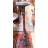 A late Victorian carved mahogany torchere, height 120cm